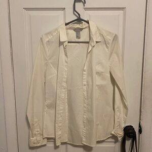 Brand new, white/cream colored button-down, never worn.